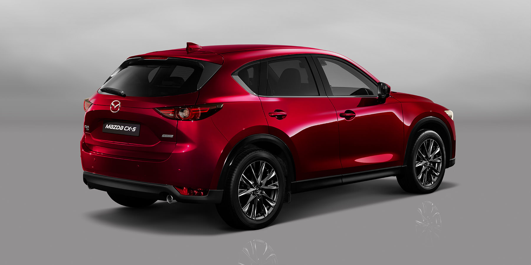 Mazda CX-5 bei Auto Stahl Modellabbildung in schräger Heckansicht, Modellfarbe rot