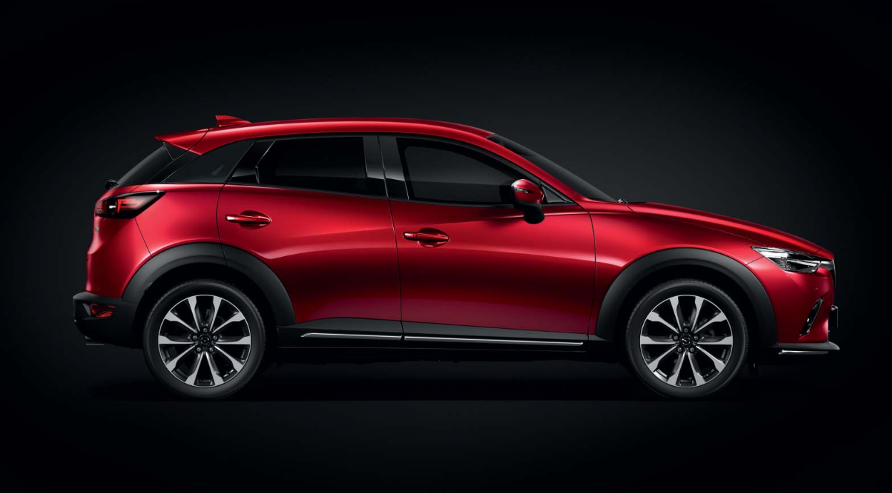 Mazda CX-3 bei Auto Stahl Detail der Modellabbildung in der Modellfarbe rot in Seitenansicht